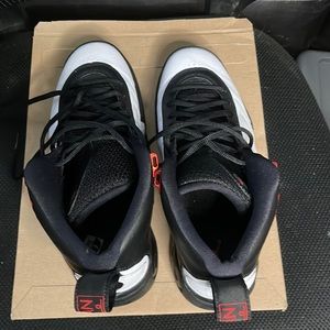 Like new pre-owned black, white and red Jumpman Jordan’s